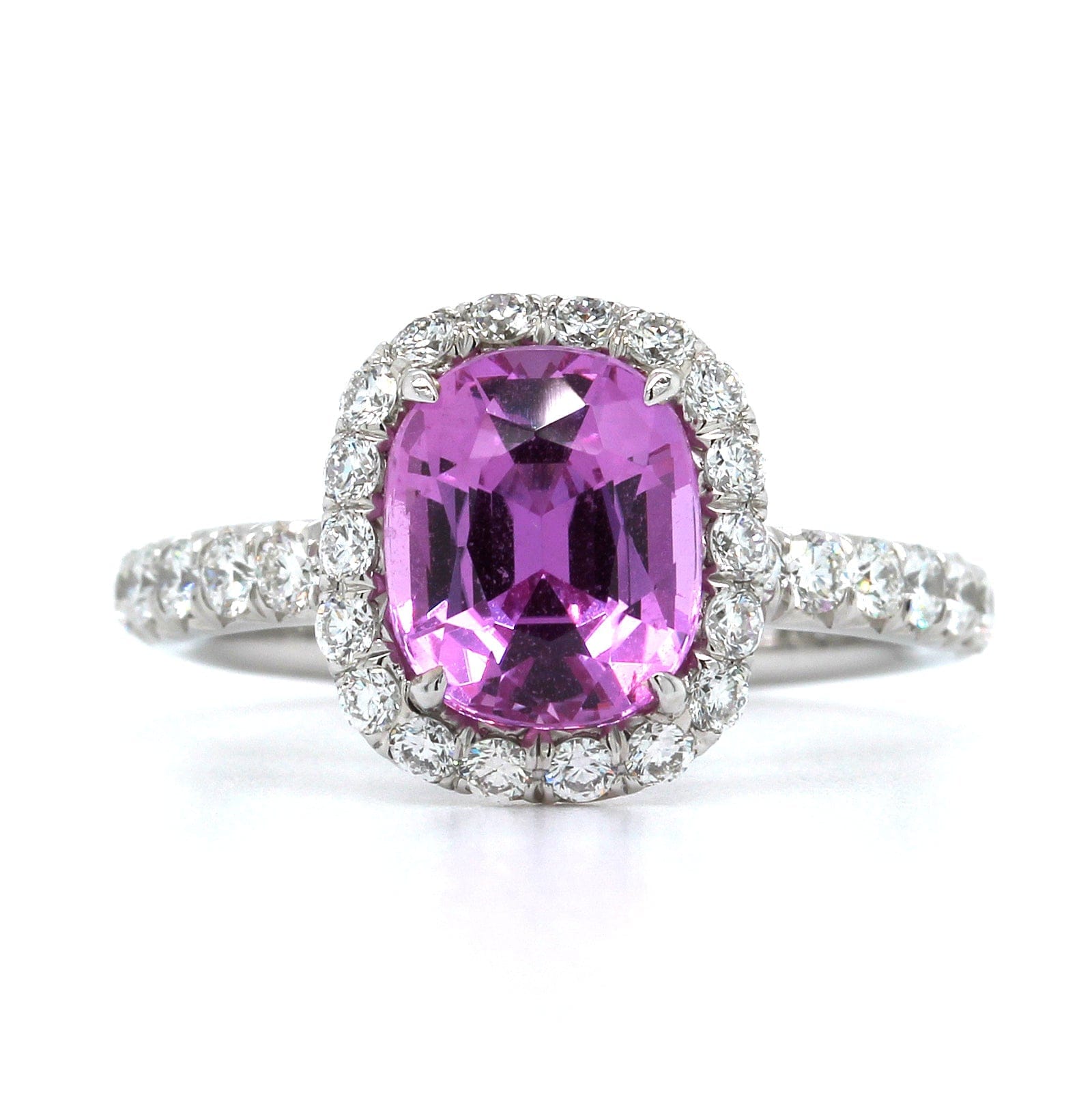 Platinum Oval Pink Sapphire and Diamond Halo Ring