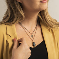 Sterling Silver and 24K Yellow Gold Giving Hand with Emerald Charm