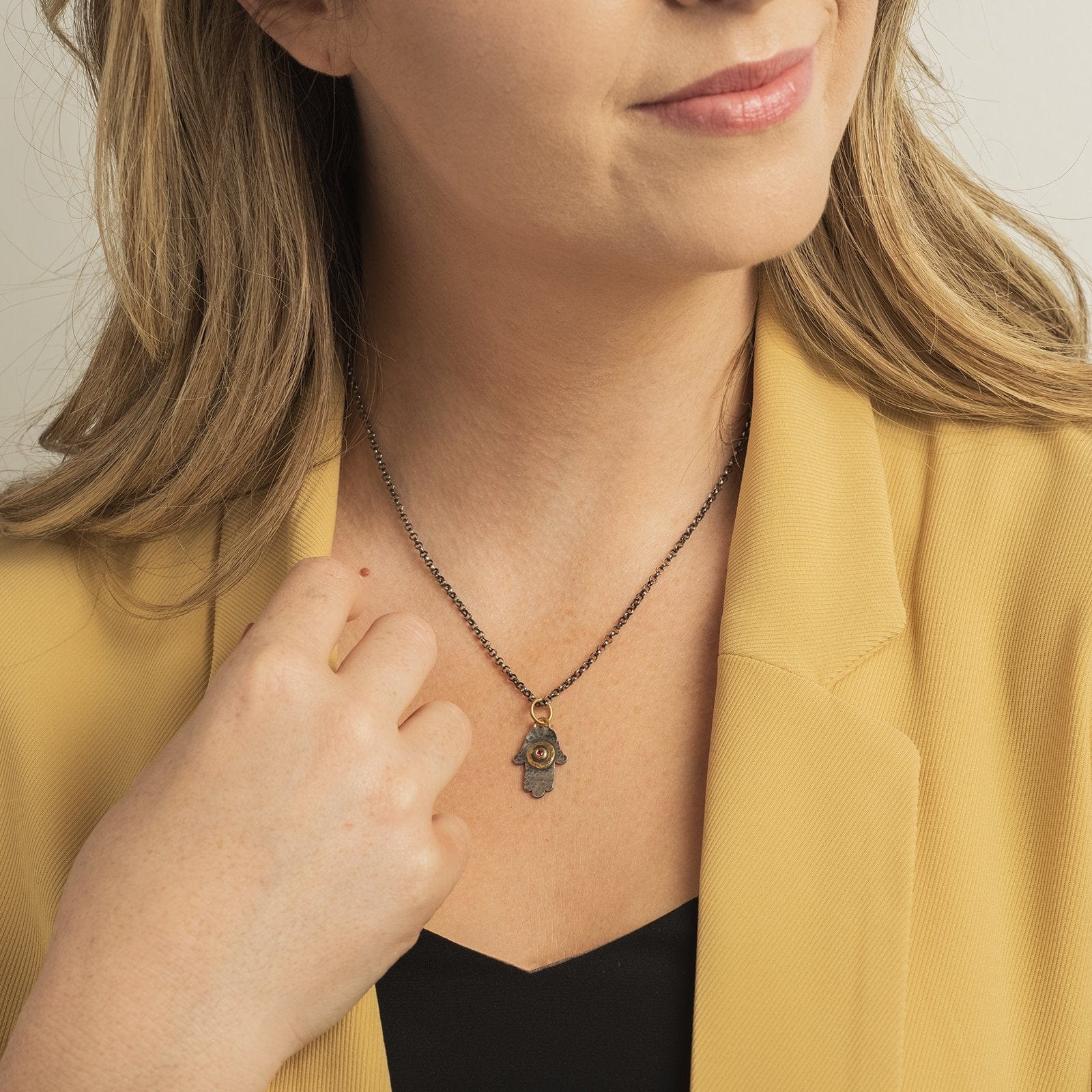 Sterling Silver and 24K Yellow Gold Hamsa with Ruby Charm